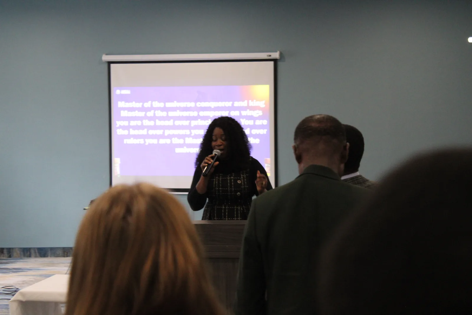 Members standing together in the sanctuary